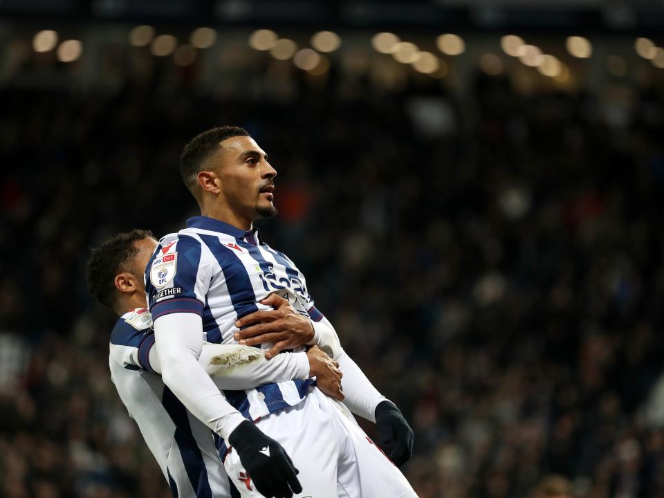 Karlan Grant celebrates scoring against Coventry City with team-mates