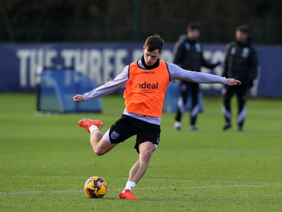 Jayson Molumby striking the ball during training 