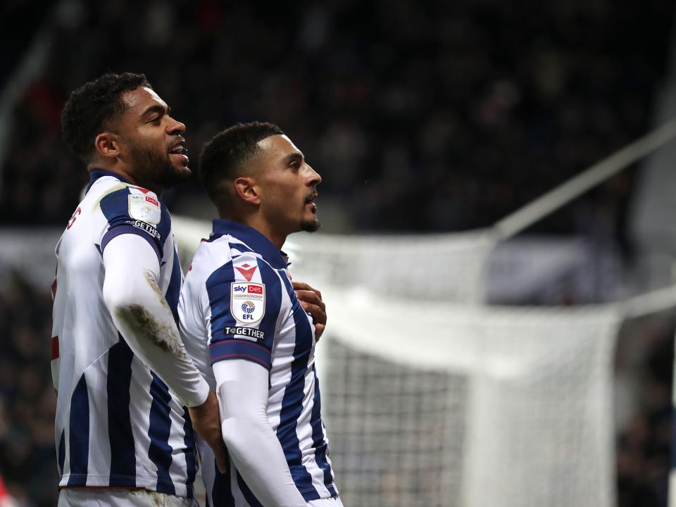 Karlan Grant celebrates scoring against Coventry City with team-mates