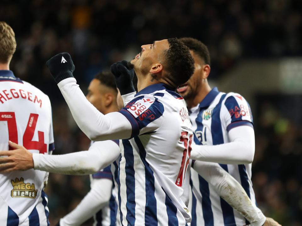 Karlan Grant celebrates scoring against Coventry City with team-mates