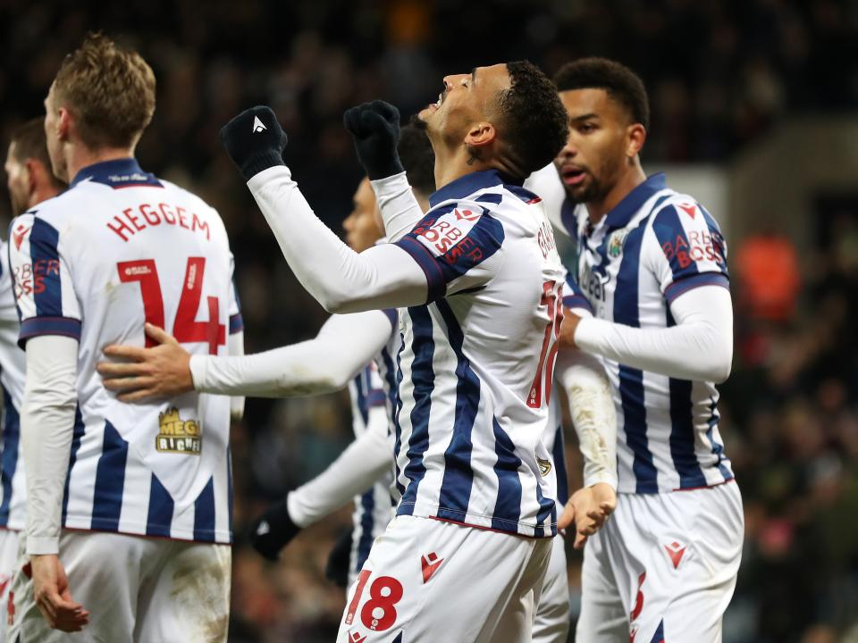 Karlan Grant celebrates scoring against Coventry City with team-mates