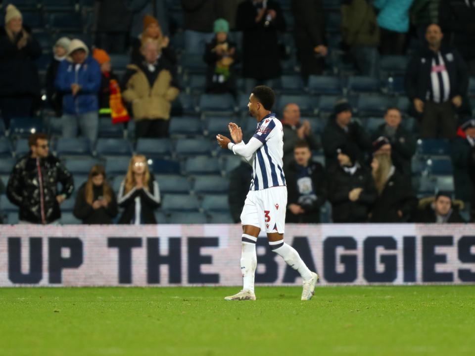 Mason Holgate applauds supporters after Albion's win against Coventry City 