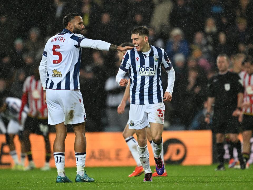 Tom Fellows celebrates scoring against Sheffield United with Kyle Bartley