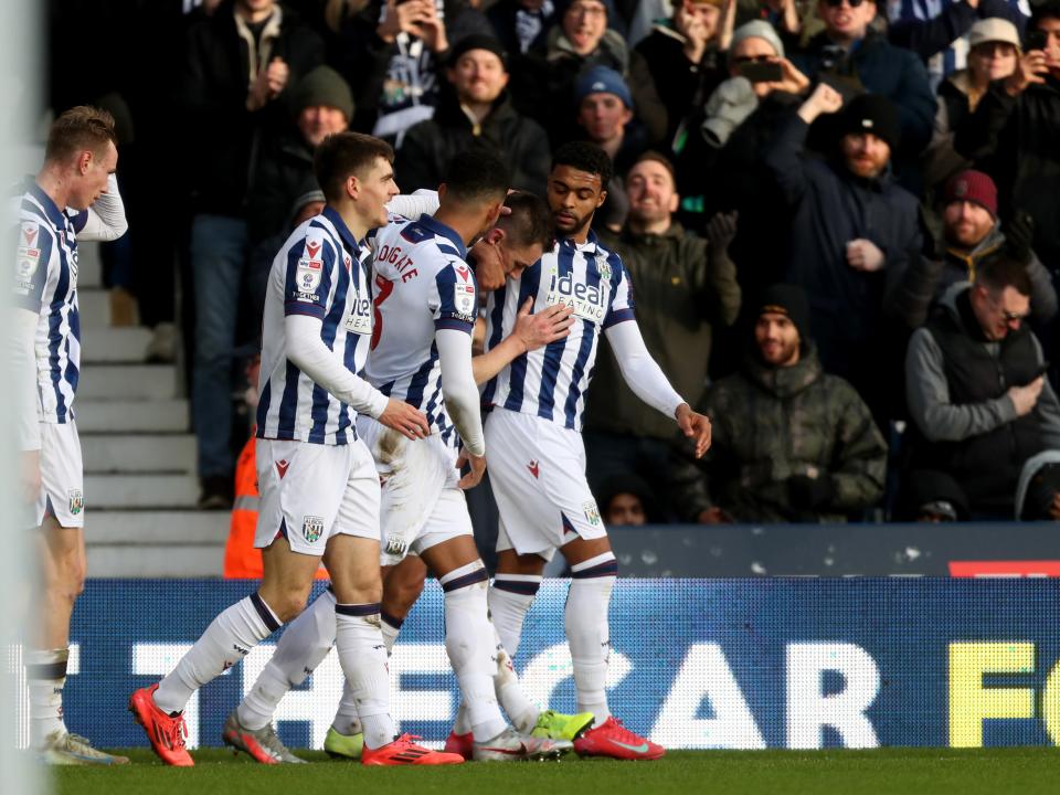 Jed Wallace celebrates scoring against Portsmouth at The Hawthorns with team-mates
