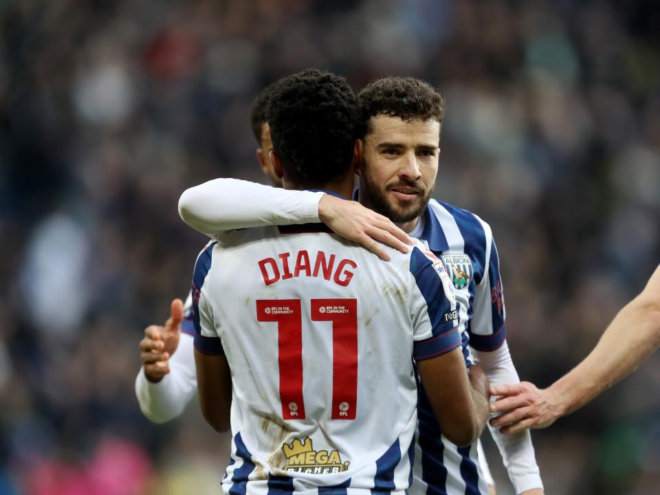 Grady Diangana celebrates scoring against Portsmouth with Mikey Johnston