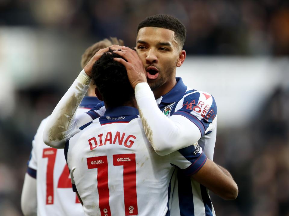 Grady Diangana celebrates scoring against Portsmouth with Mason Holgate