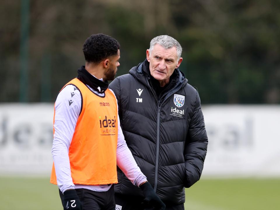 Tony Mowbray chatting to Darnell Furlong