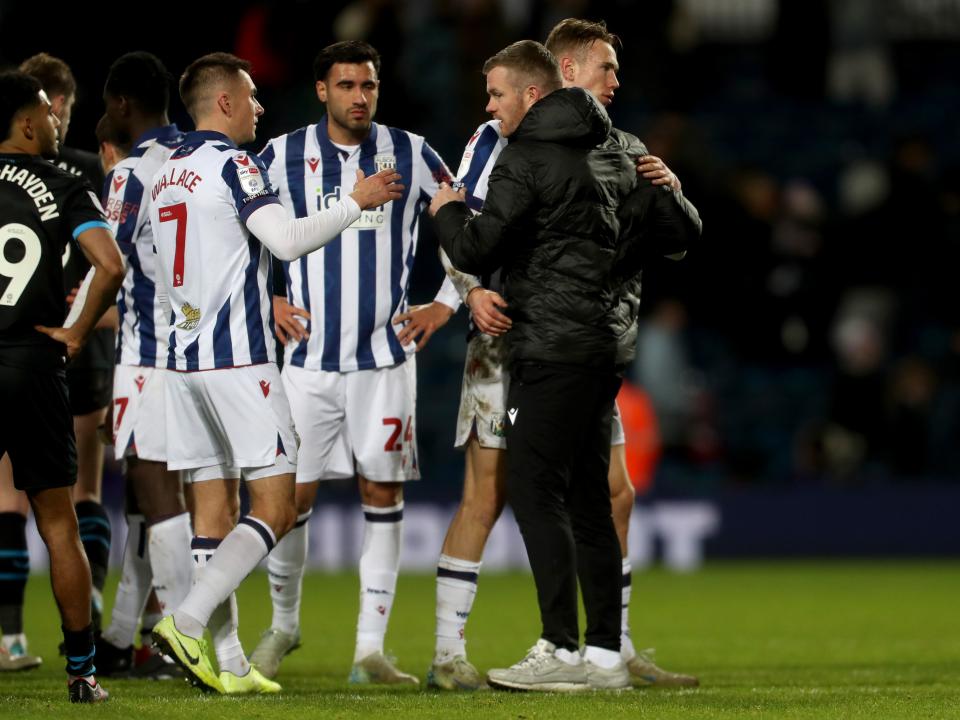 Chris Brunt congratulating the players after the win over Preston 