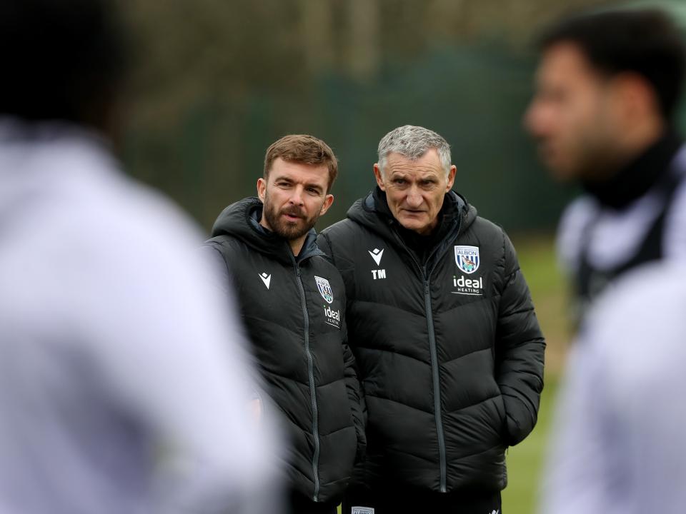 James Morrison stood with Tony Mowbray watching training