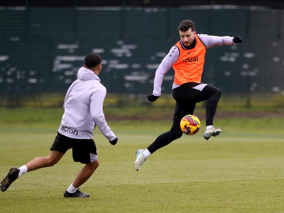 Mikey Johnston on the ball during a training session