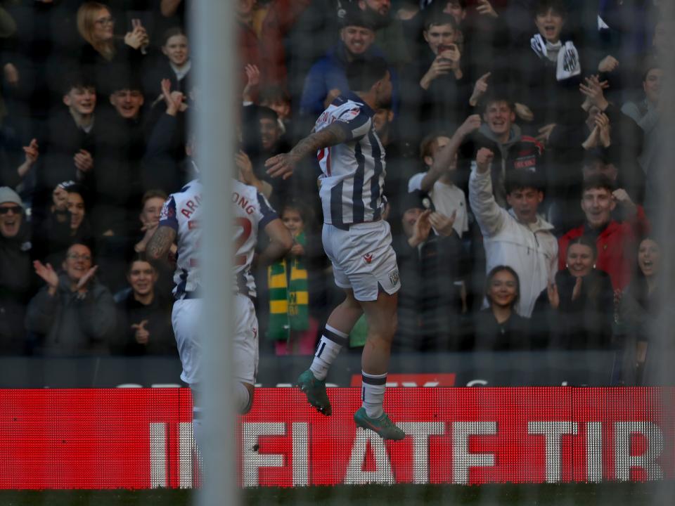Alex Mowatt celebrates scoring against Oxford at The Hawthorns 