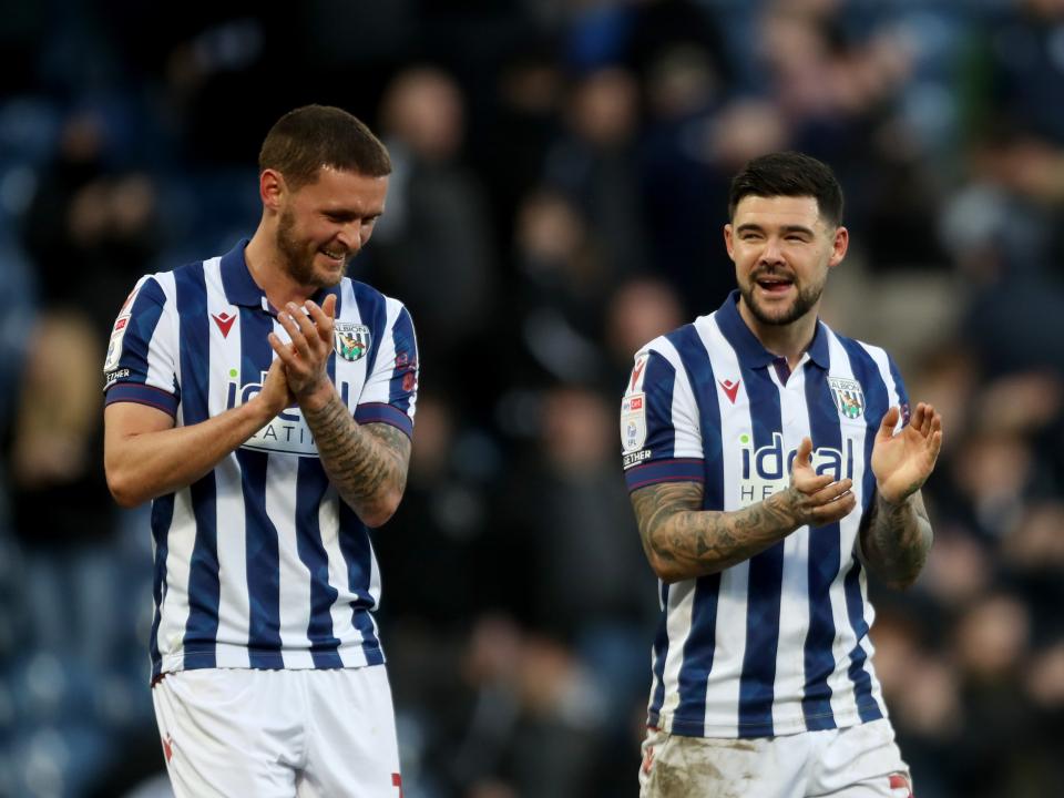 John Swift and Alex Mowatt applauding Albion fans after the Oxford game