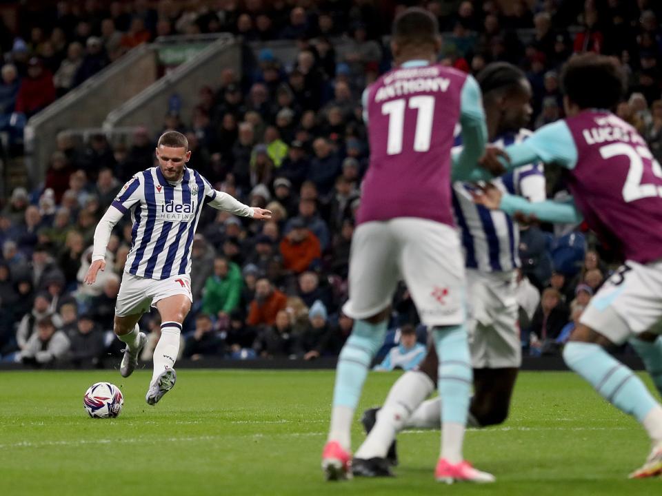 John Swift takes a free-kick at Burnley 