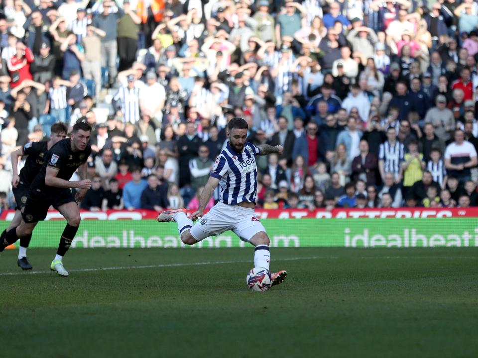 Adam Armstrong takes a penalty against QPR 