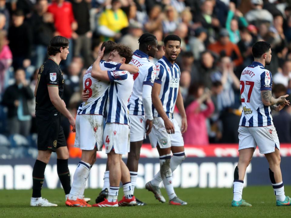 Albion players congratulate each other after a win against QPR 