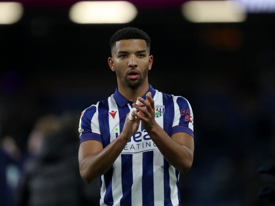 Mason Holgate applauding Albion fans after the game at Burnley