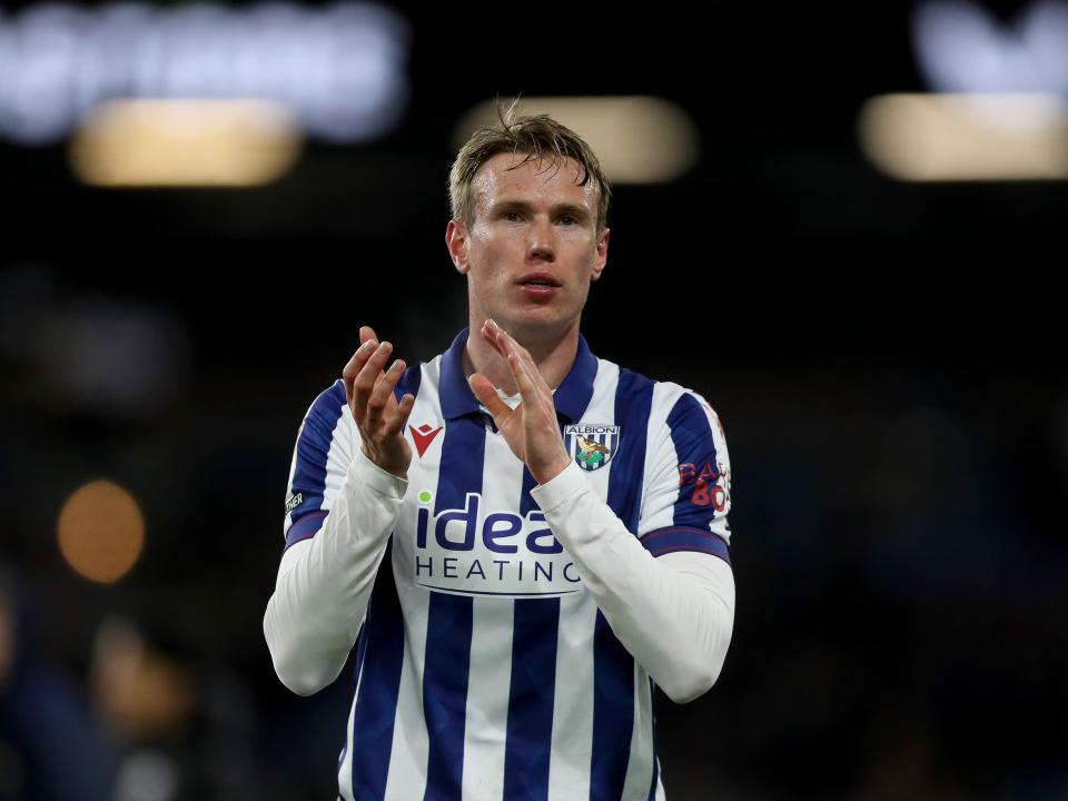 Torbjørn Heggem applauding Albion fans after the game at Burnley