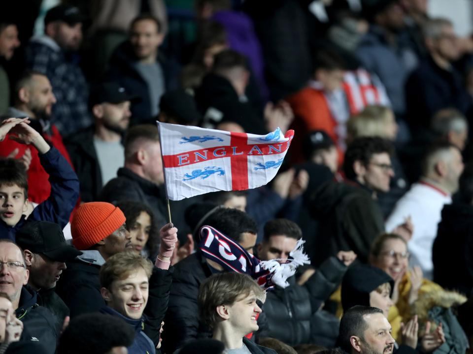 England fans in the stands at The Hawthorns with England flags