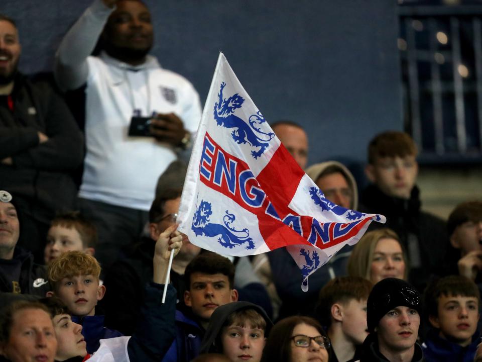 England fans in the stands at The Hawthorns with England flags