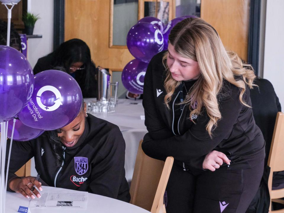 Eve and Ocean work on a word search.