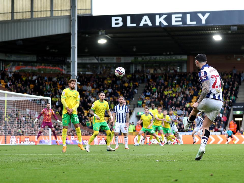 An image of Alex Mowatt taking a free kick against Norwich
