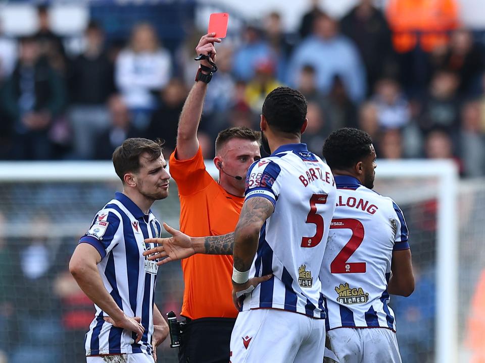 Darnell Furlong is shown a red card against QPR 