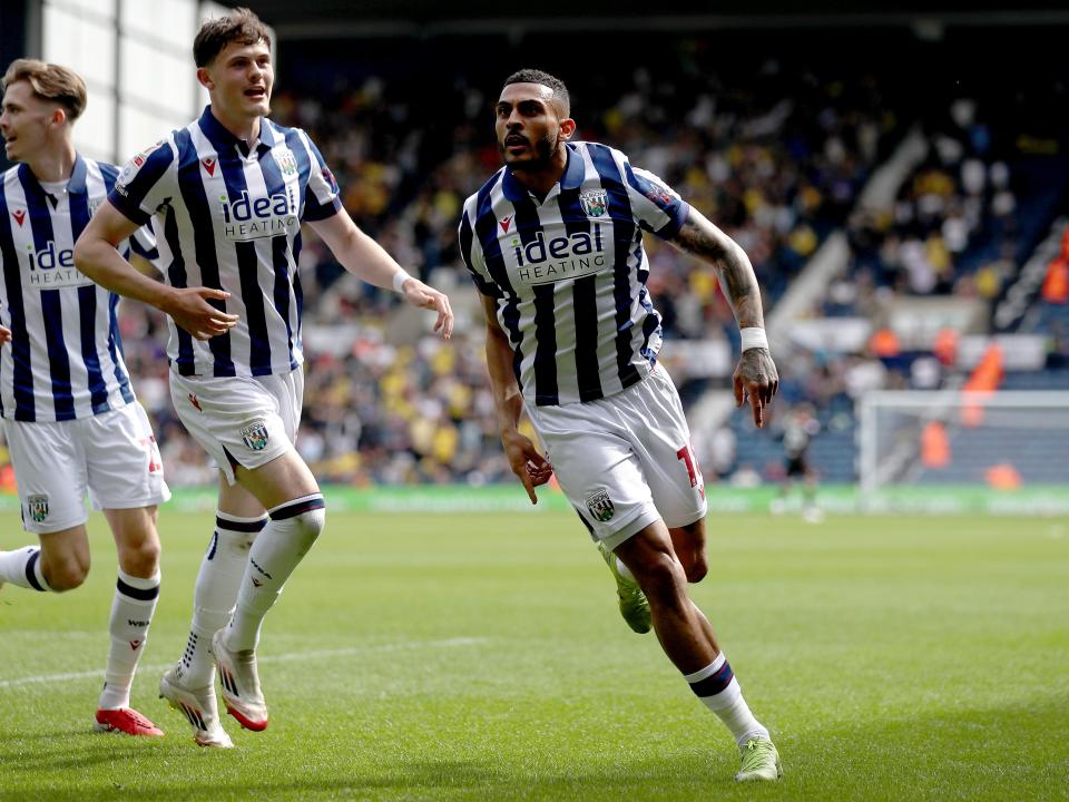 karlan Grant celebrates scoring against Watford