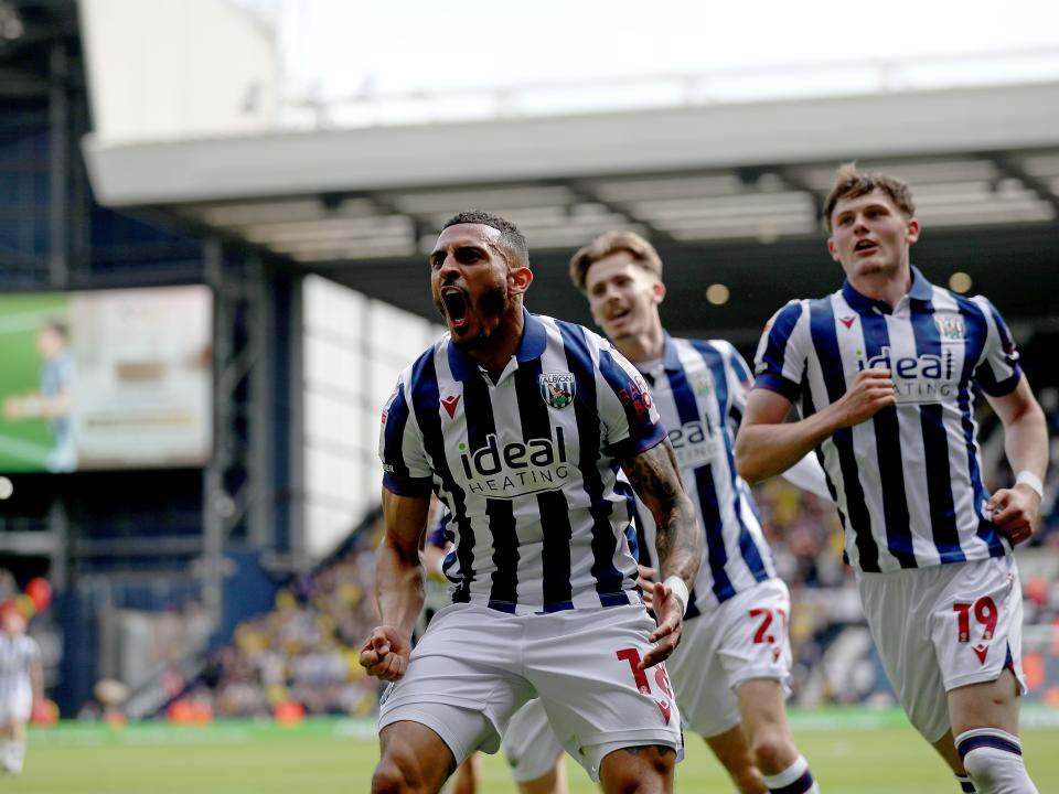 karlan Grant celebrates scoring against Watford with team-mates