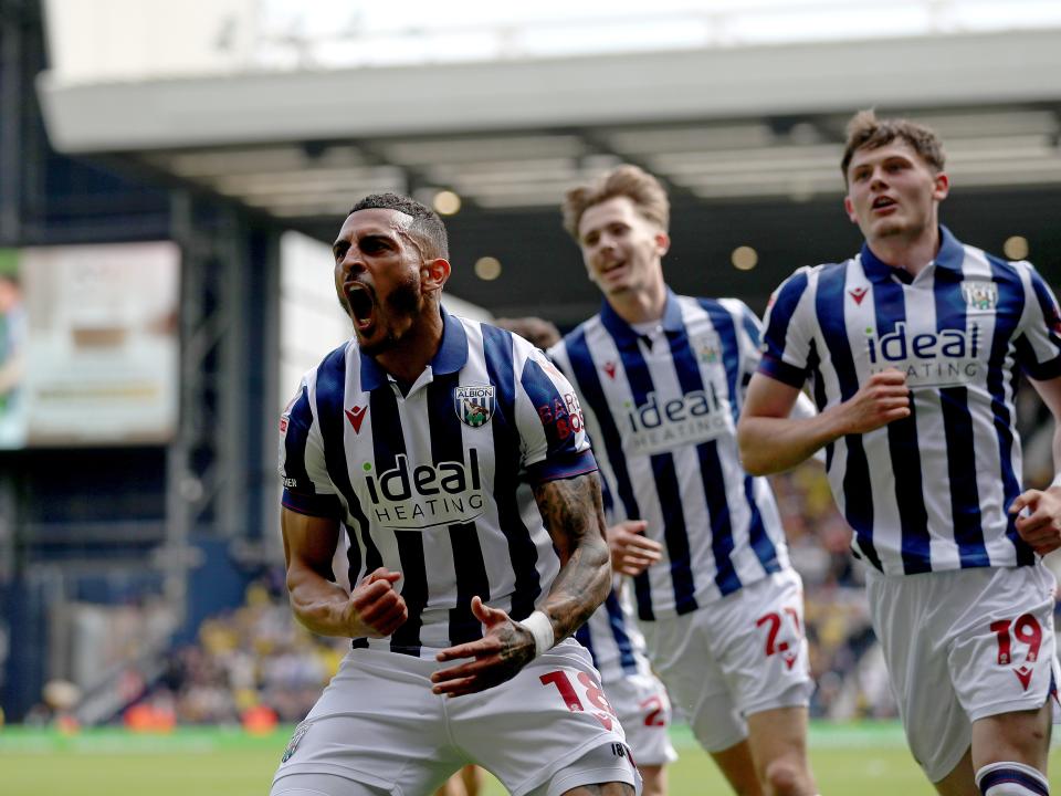 karlan Grant celebrates scoring against Watford with team-mates