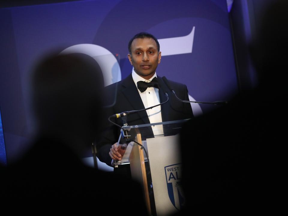 Shilen Patel on stage at the end of season awards dinner