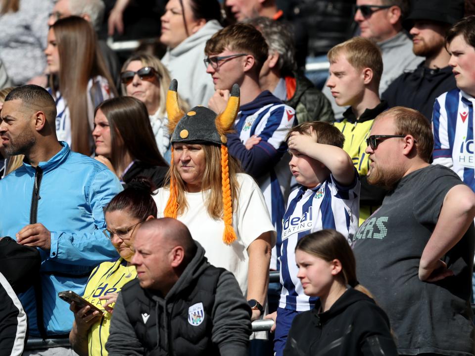A general view of several Albion fans in the away end at Cardiff