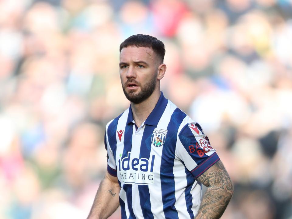 Adam Armstrong in action for Albion in the home kit 