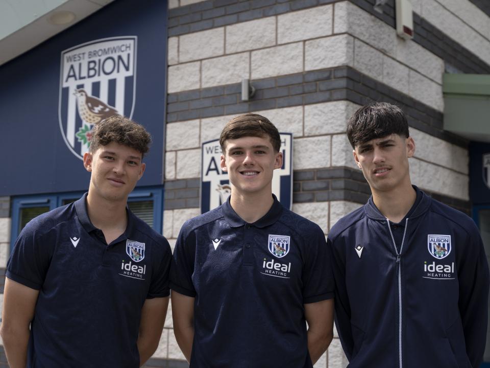 A photo of Albion youngsters Noah DuPont, Matt Crowther and Rio Parmar in front of the Albion training ground