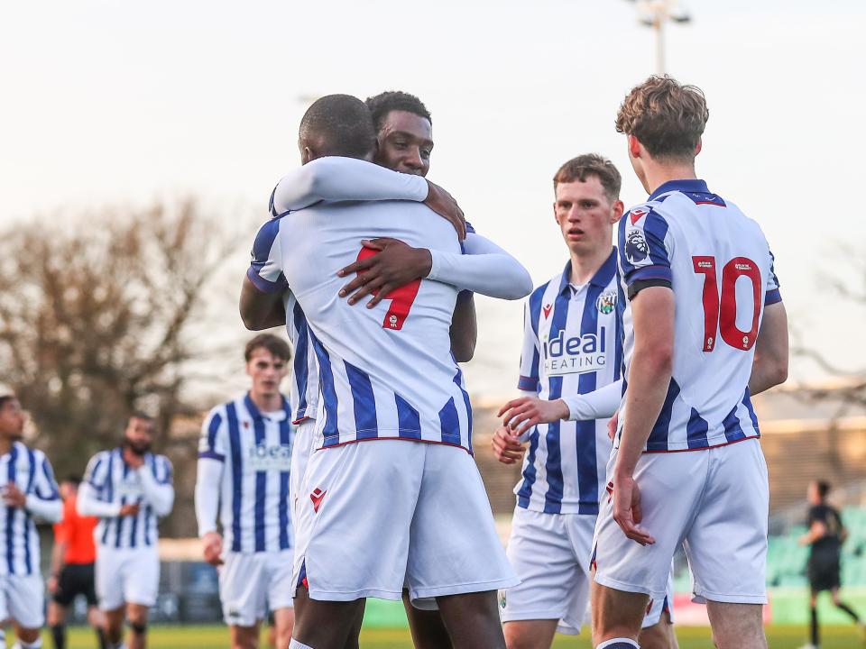 A photo of U21 players Souleyman Mandey and Eseosa Sule embracing after scoring a goal
