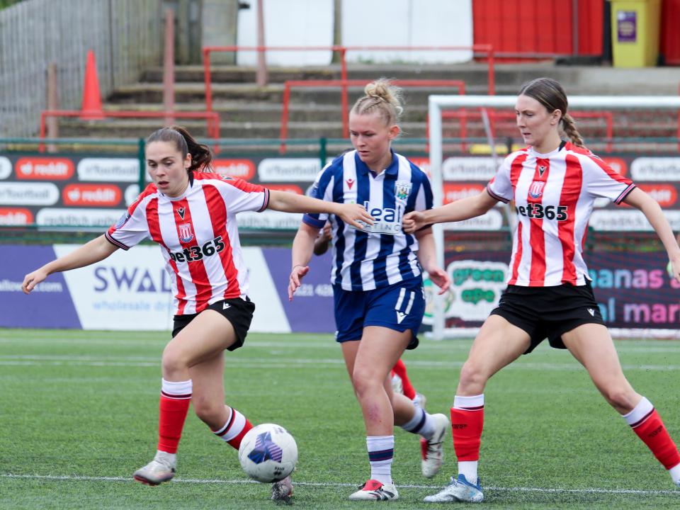 Marli Rhodes-Andrews in action for Albion Women in the home kit against Stoke City