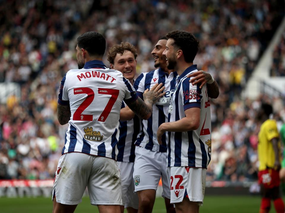 An image of Mikey Johnston celebrating his goal against Watford with his teammates