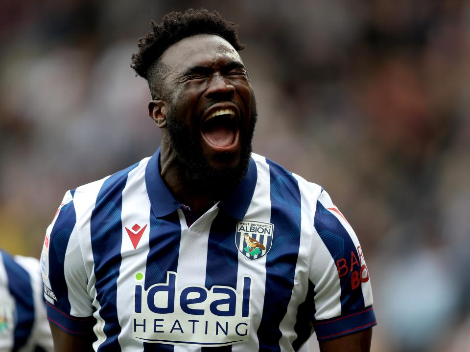 Daryl Dike celebrates after scoring against Luton Town
