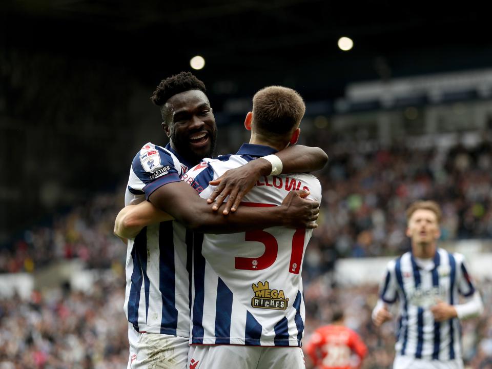 An image of Daryl Dike and Tom Fellows celebrating a goal against Luton