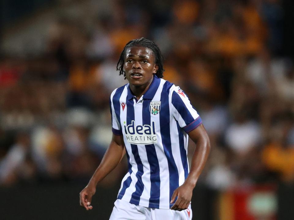 Divine Onyemachi in action for Albion in the home kit 