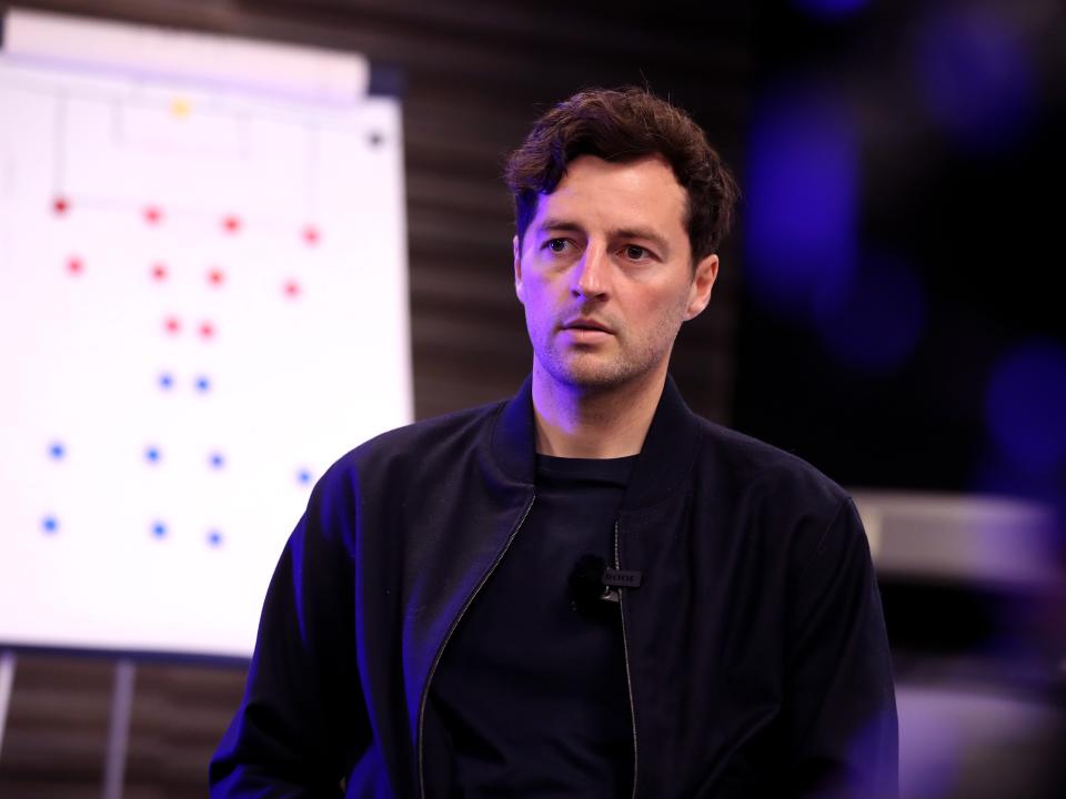 Ryan Mason sat in front of a tactics board