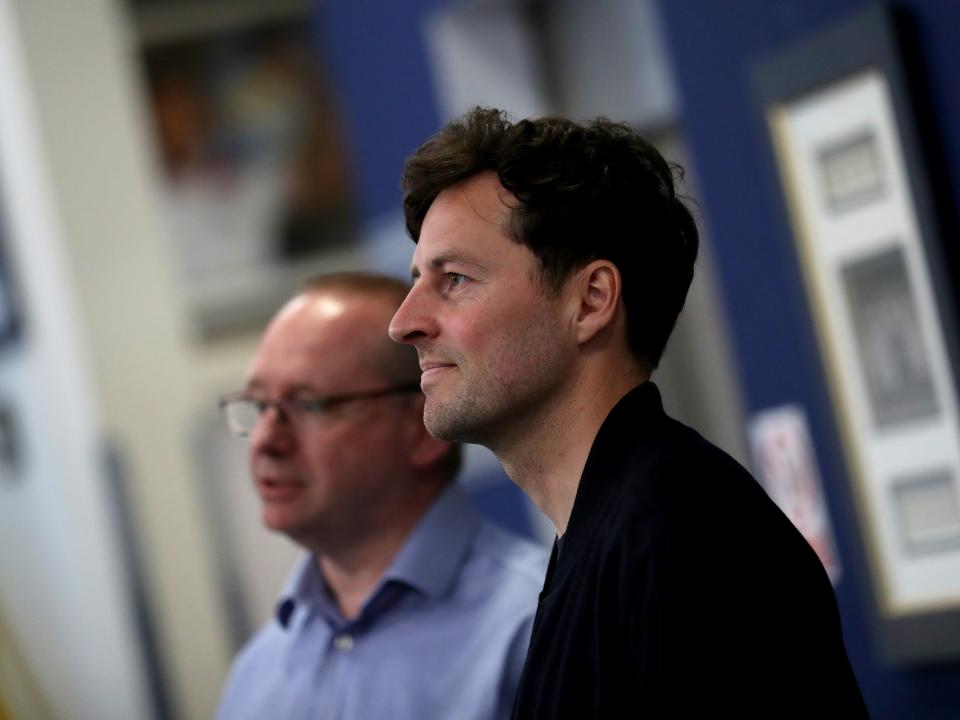 Ryan Mason and Mark Miles sat down looking in the same direction