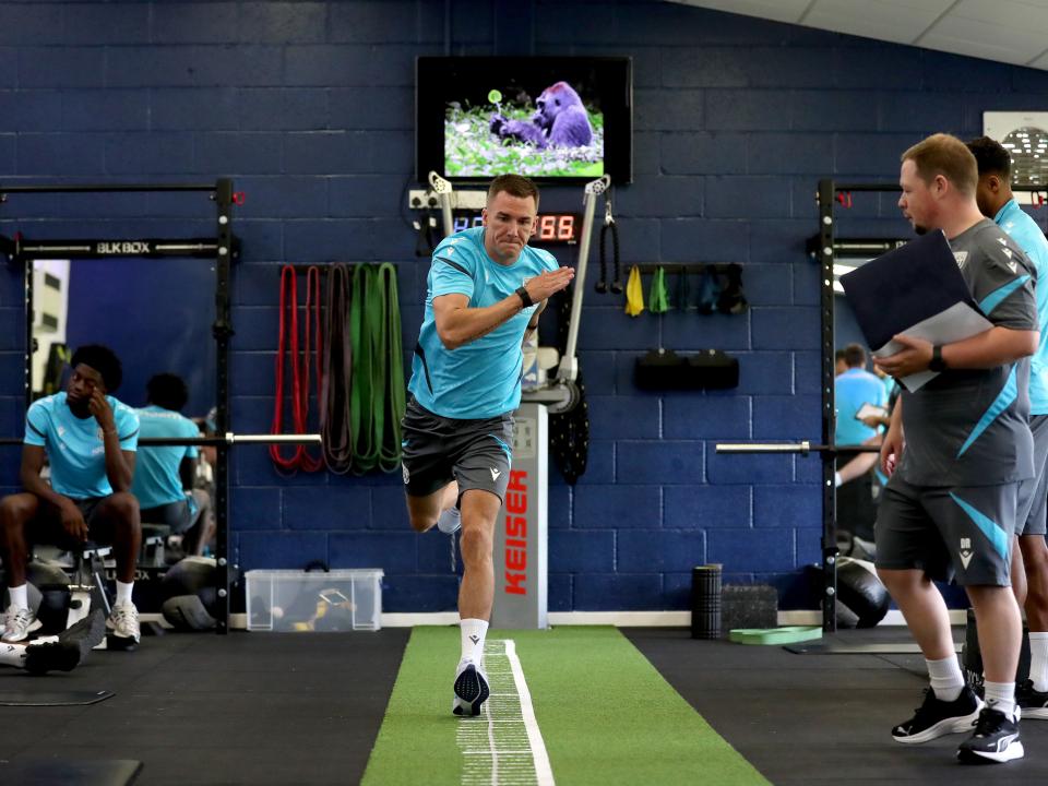 Jed Wallace carrying out a jumping test in the gym