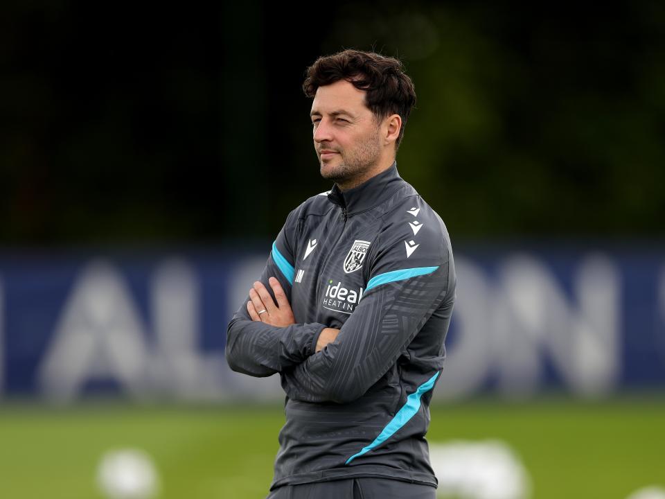 Ryan Mason watching training 