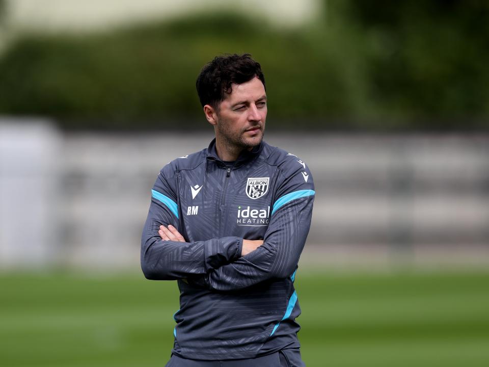 Ryan Mason watching training