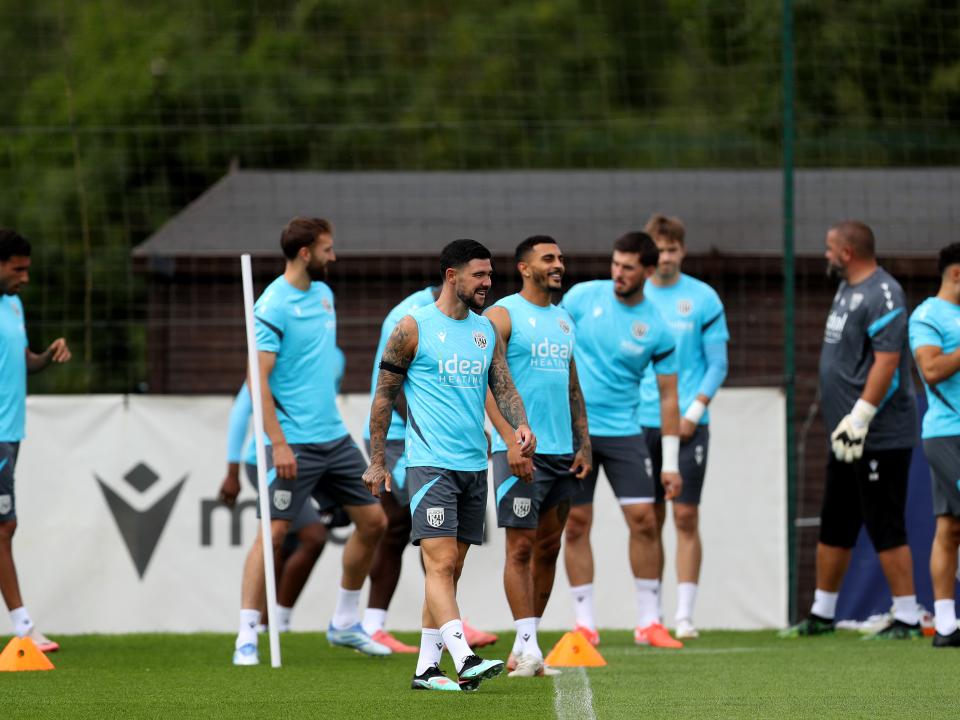 Several Albion players getting ready to start a training session