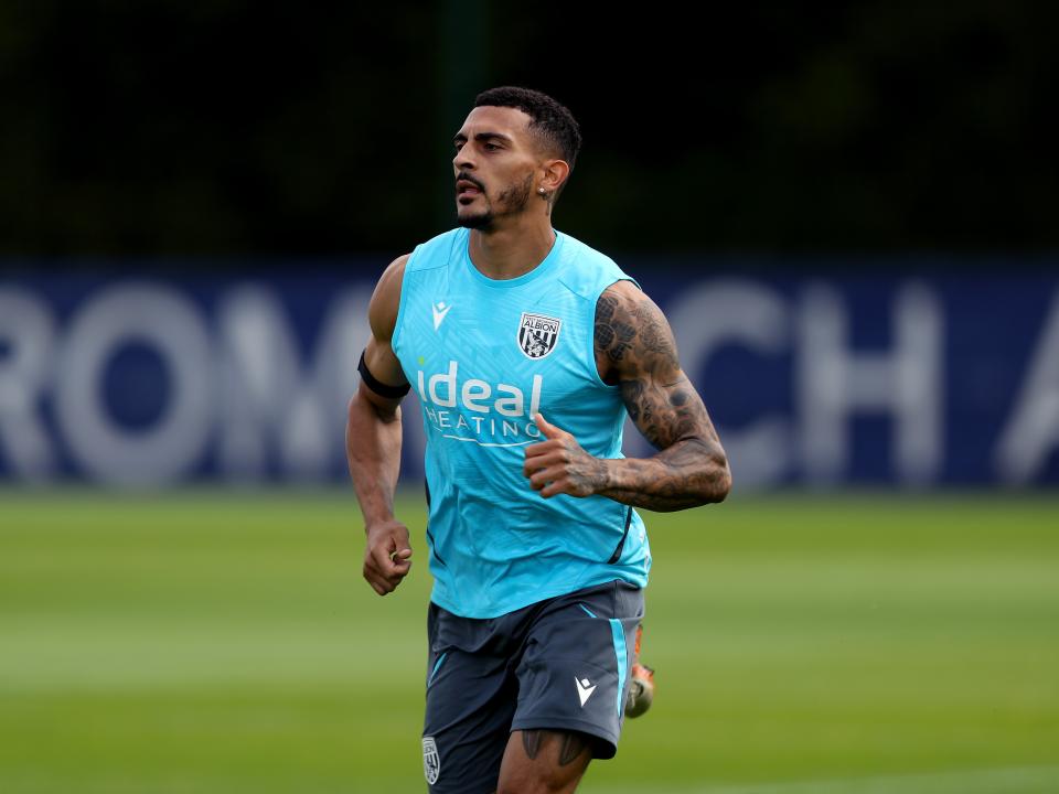 Karlan Grant running during a training session