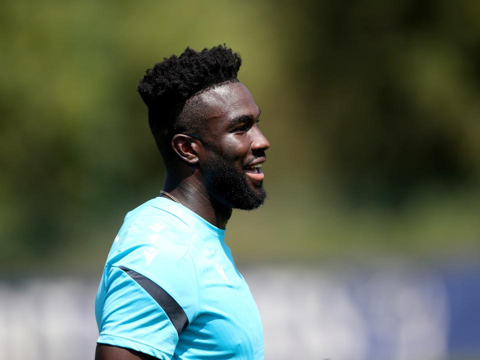 Daryl Dike smiling during a training session