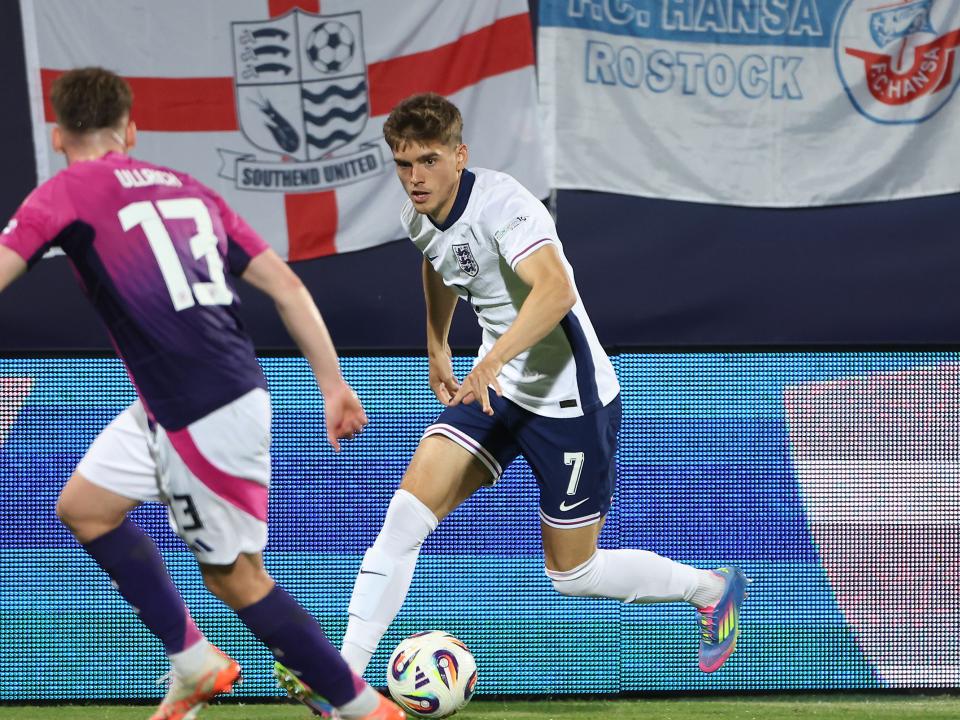 A photo of Tom Fellows in action for England U21s against Germany