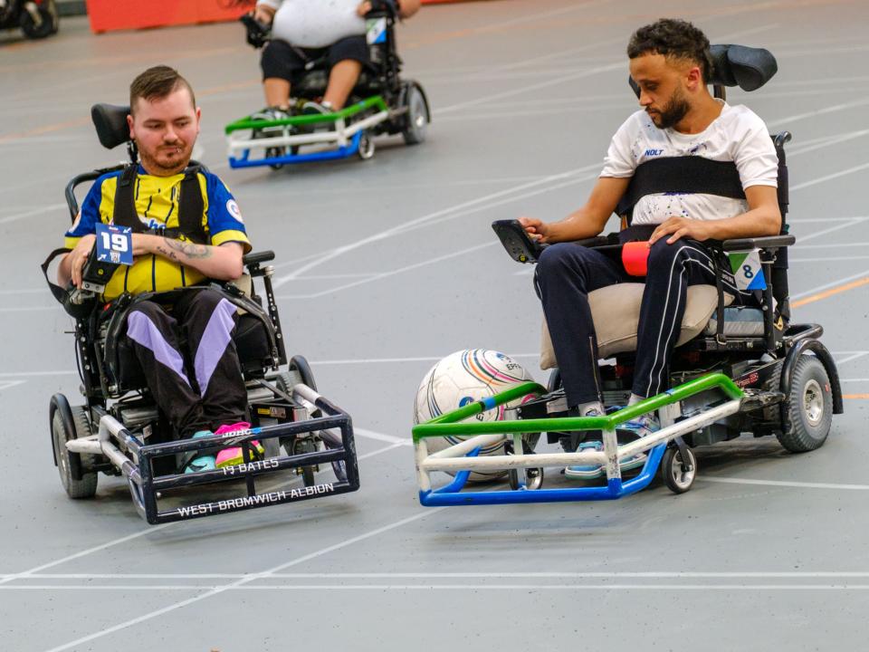 Brad Bates competes for possession.