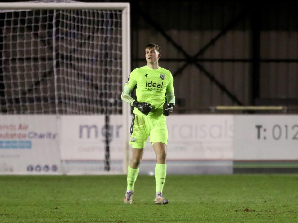 A photo of Albion U21 goalkeeper Joe Wallis in the yellow 24/25 goalkeeper kit